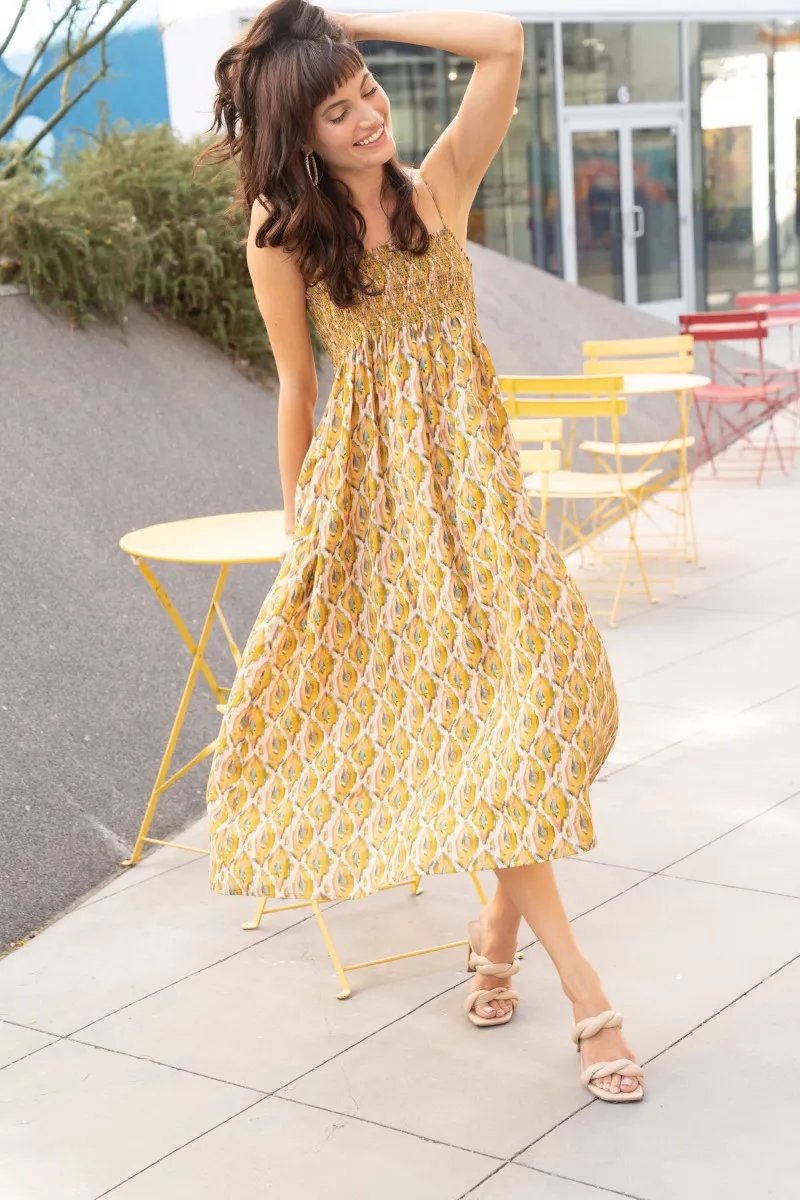 The Ilse Smocked Ikat Maxi Dress